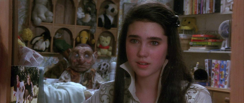 Jennifer Connelly, with a li’l friend behind her.